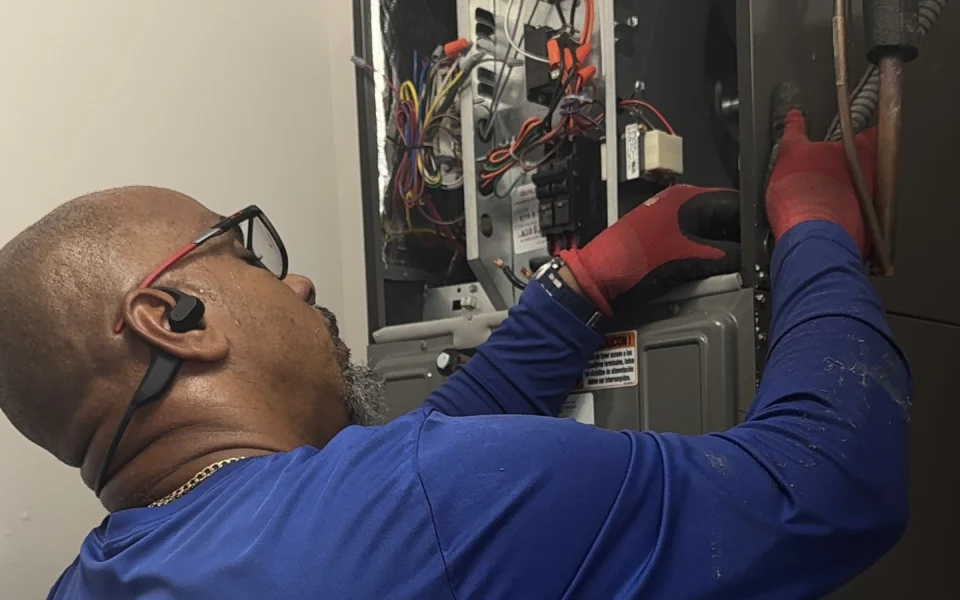 Max repairing an indoor air handler