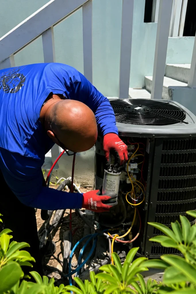 Max repairing an outdoor AC condenser